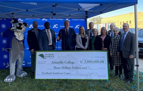 Staff Photo with check at Amarillo College