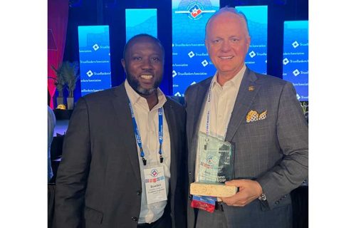 Andy Marshall and Bowden Jones, Jr. with Cornerstone award