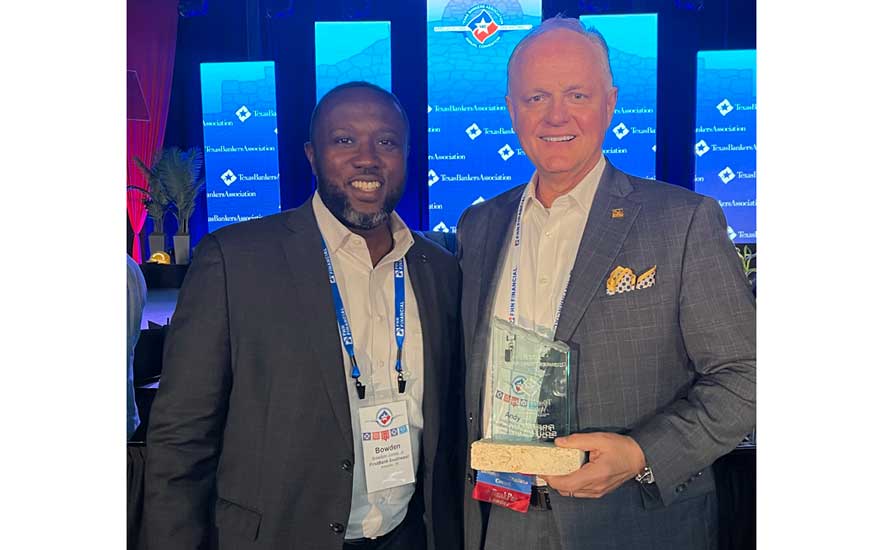 Andy Marshall and Bowden Jones, Jr. with Cornerstone award